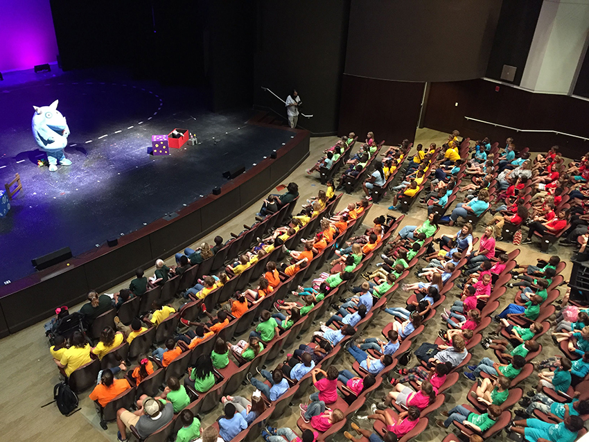 Hundreds of elementary students enjoy theatre for the first time.