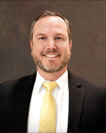 Board member smiling for headshot