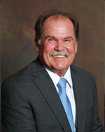 Board member smiling for headshot