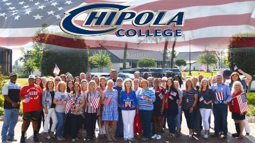 Faculty and Staff Pose for the First Annual Independence Day Photo Op