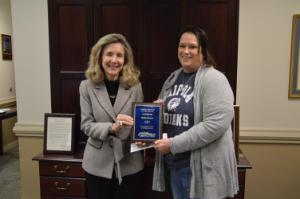 President Sarah Clemmons on left and Career Employee of the Month Sheila Mercer on right