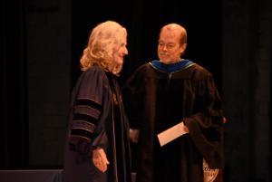 President Dr. Sarah Clemmons posing for a picture with Jeffrey Bodart after he received the Kirkland Award