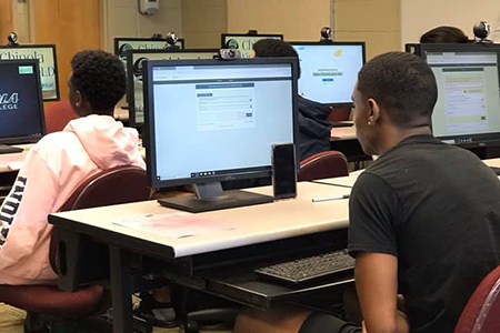 Student completing financial aid application